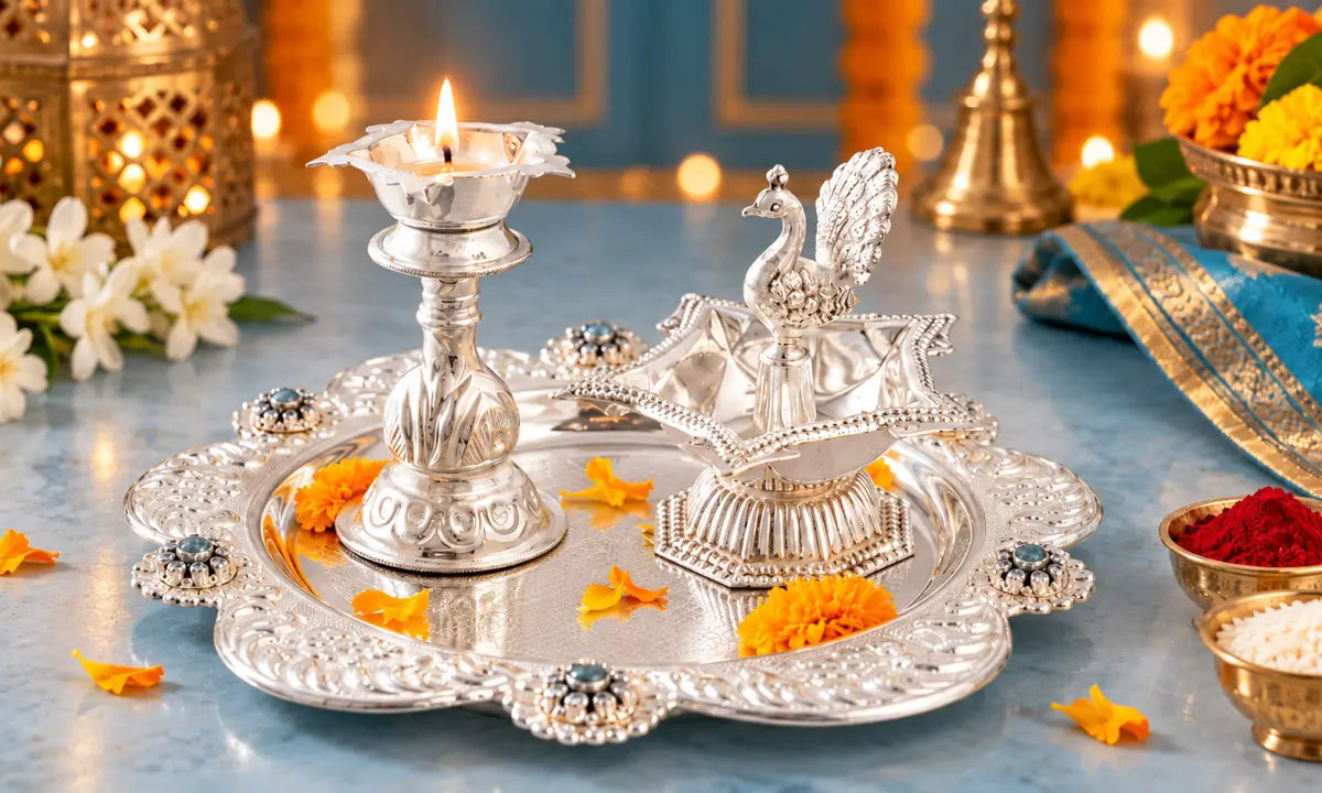 Ganpati Bappa Morya: Essential silver pooja items (Diyas, Samai, Niranjan) for the festival.